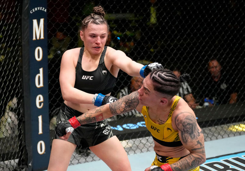 Erin Blanchfield punches Jessica Andrade of Brazil in a flyweight fight during the UFC Fight Night event at UFC APEX on February 18, 2023 in Las Vegas, Nevada. (Photo by Jeff Bottari/Zuffa LLC via Getty Images)