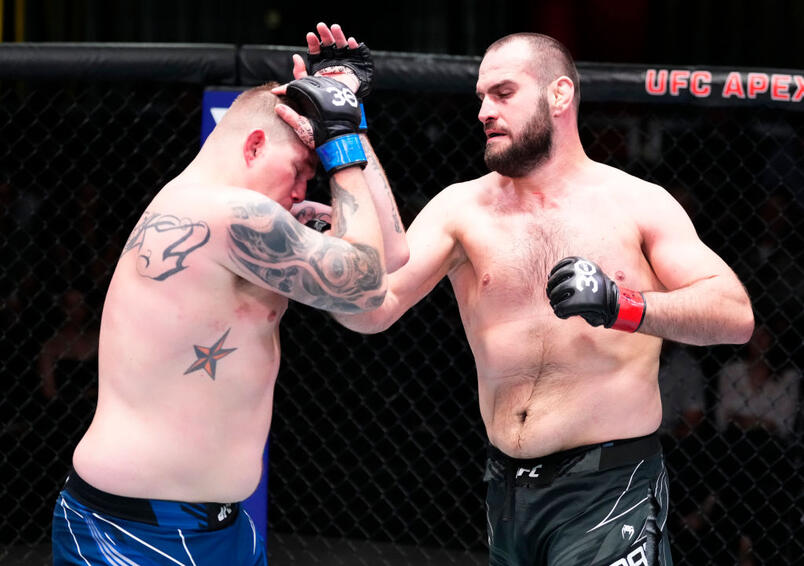 Martin Buday of Slovakia punches Jake Collier in a heavyweight fight during the UFC Fight Night event at UFC APEX on April 29, 2023 in Las Vegas, Nevada. (Photo by Jeff Bottari/Zuffa LLC)