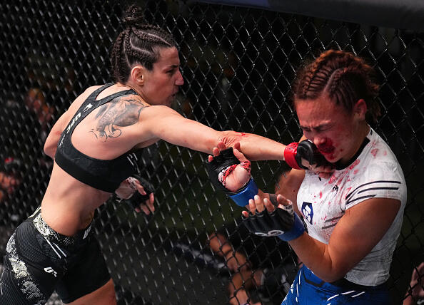 Marina Rodriguez of Brazil punches Michelle Waterson-Gomez in a strawweight fight during the UFC Fight Night event at UFC APEX on September 23, 2023 in Las Vegas, Nevada. (Photo by Chris Unger/Zuffa LLC)