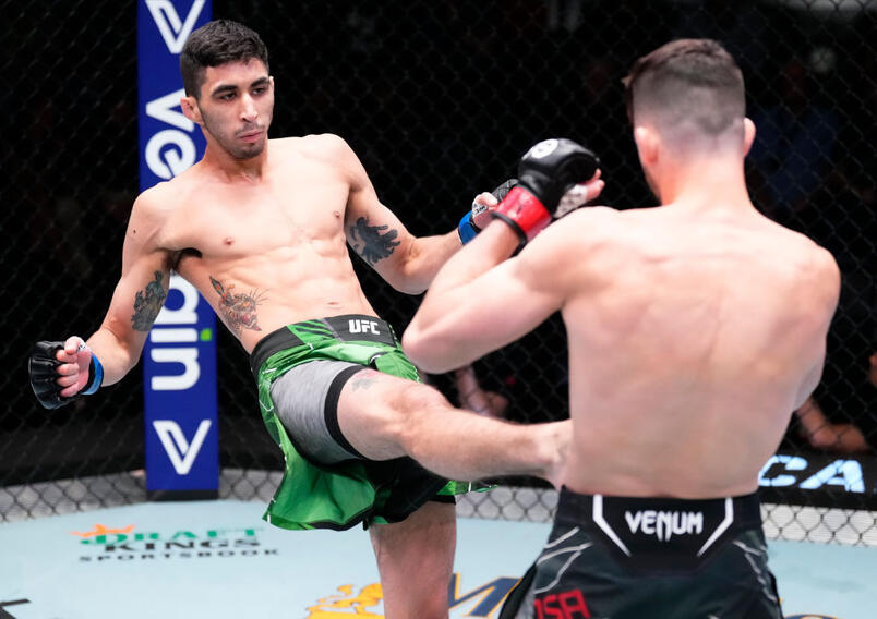 Fernando Padilla of Mexico kicks Julian Erosa in a featherweight fight during the UFC Fight Night event at UFC APEX on April 29, 2023 in Las Vegas, Nevada. (Photo by Jeff Bottari/Zuffa LLC)