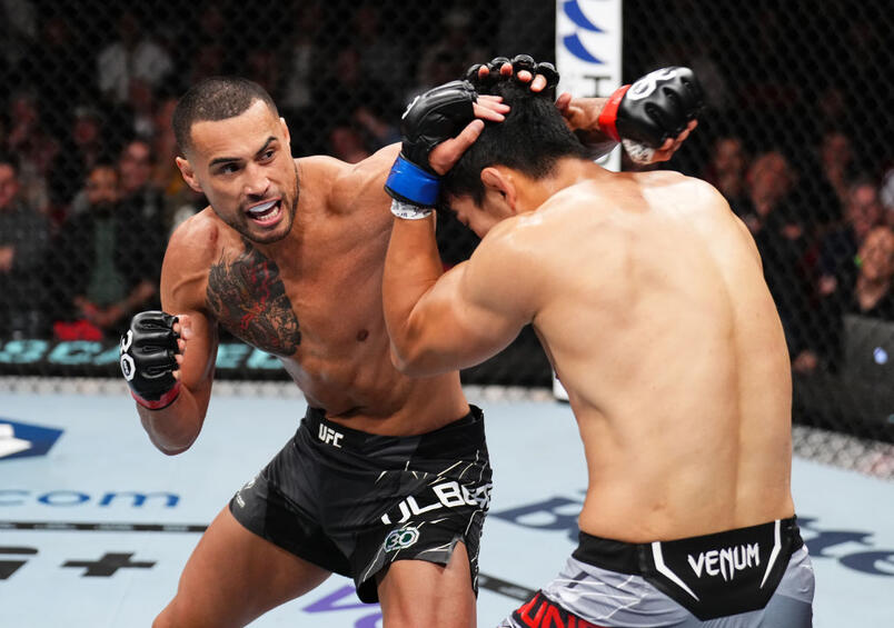 Carlos Ulberg of New Zealand punches Da Woon Jung of South Korea in a light heavyweight fight during the UFC 293 event at Qudos Bank Arena on September 10, 2023 in Sydney, Australia. (Photo by Chris Unger/Zuffa LLC)