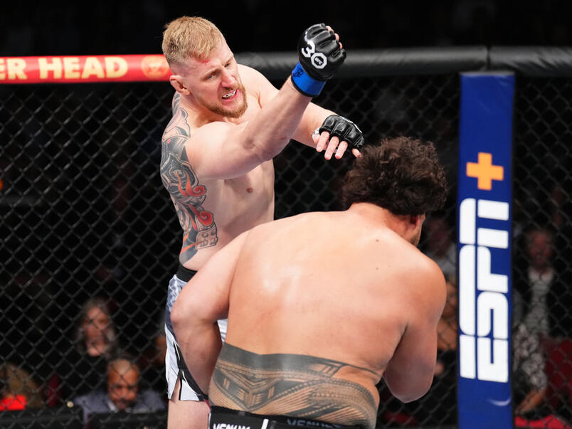 Alexander Volkov of Russia punches Tai Tuivasa of Australia in a heavyweight fight during the UFC 293 event at Qudos Bank Arena on September 10, 2023 in Sydney, Australia. (Photo by Chris Unger/Zuffa LLC)