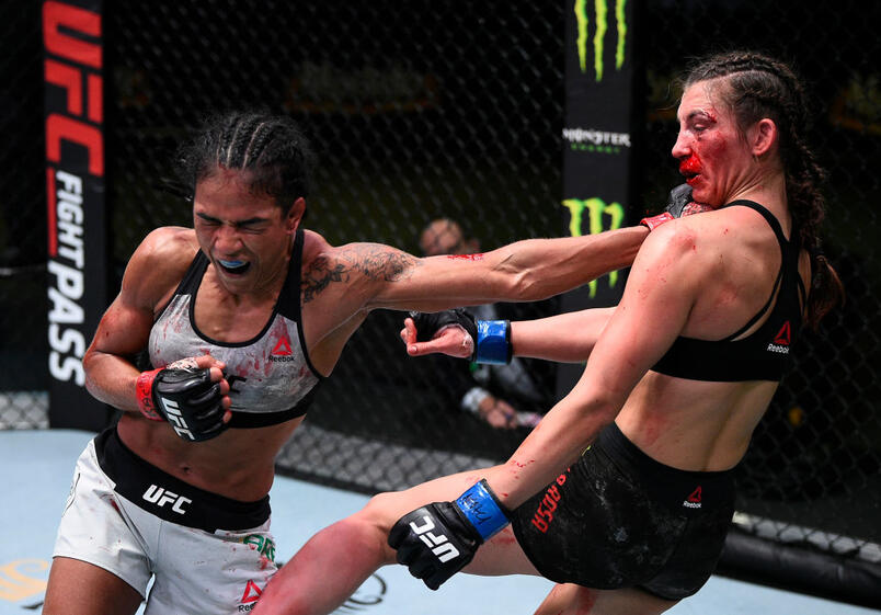 SEPTEMBER 05: (L-R) Viviane Araujo of Brazil punches Montana De La Rosa in a flyweight fight during the UFC Fight Night event at UFC APEX on September 05, 2020 in Las Vegas, Nevada. (Photo by Chris Unger/Zuffa LLC)