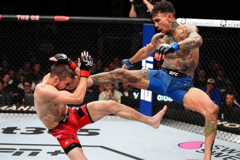 Andre Fili kicks Nathaniel Wood of England in their featherweight fight during the UFC Fight Night at The O2 Arena on July 22, 2023 in London, England. (Photo by Chris Unger/Zuffa LLC)