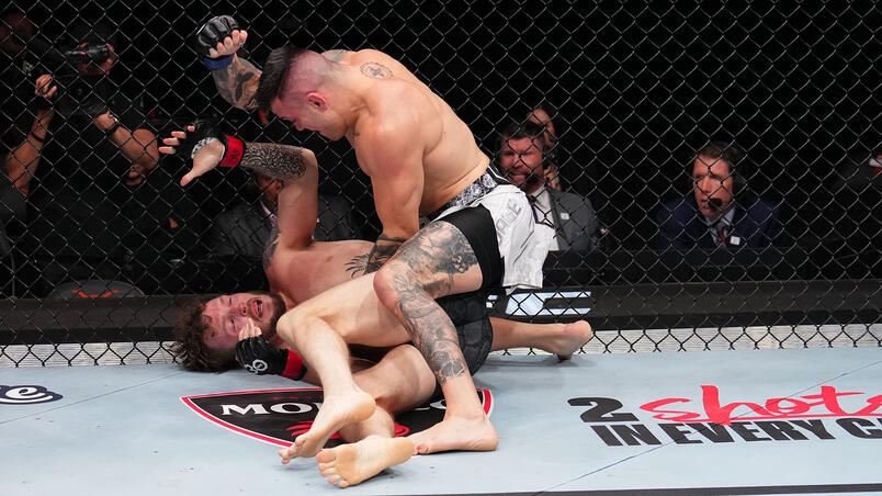 Cody Brundage punches Zachary Reese in a middleweight fight during the UFC Fight Night event at Moody Center on December 02, 2023 in Austin, Texas. (Photo by Josh Hedges/Zuffa LLC)
