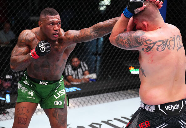 Mohammed Usman of Nigeria punches Jake Collier in a heavyweight fight during the UFC Fight Night event at UFC APEX on September 23, 2023 in Las Vegas, Nevada. (Photo by Chris Unger/Zuffa LLC)