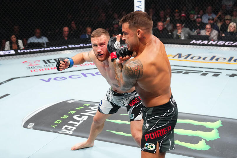 Justin Gaethje punches Dustin Poirier in a lightweight fight for the BMF belt during the UFC 291 event at Delta Center on July 29, 2023 in Salt Lake City, Utah. (Photo by Josh Hedges/Zuffa LLC)