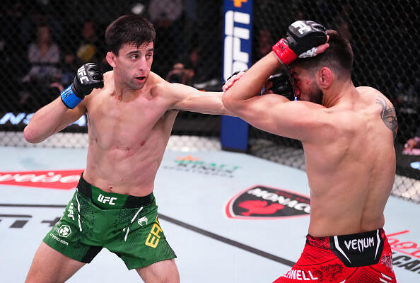 teve Erceg of Australia punches Matt Schnell in a flyweight bout during the UFC Fight Night event at UFC APEX on March 02, 2024 in Las Vegas, Nevada. (Photo by Jeff Bottari/Zuffa LLC)