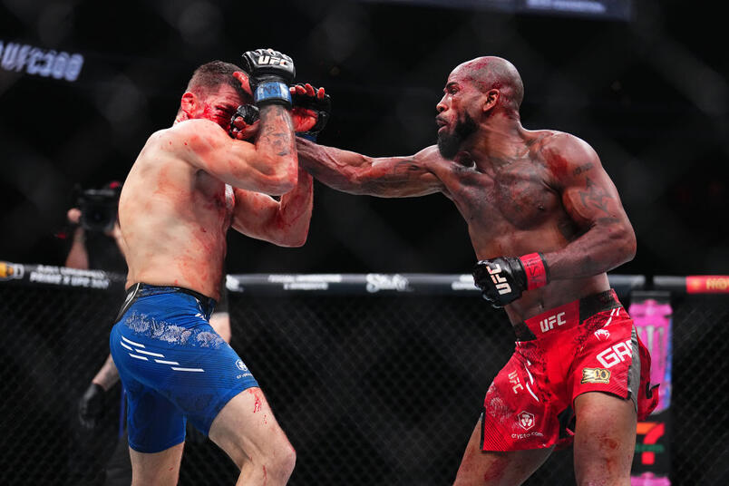 Bobby Green punches Jim Miller in a lightweight fight during the UFC 300 event at T-Mobile Arena on April 13, 2024 in Las Vegas, Nevada. (Photo by Chris Unger/Zuffa LLC)
