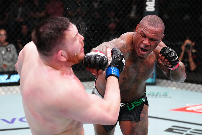 Mohammed Usman of Nigeria punches Mick Parkin of England in a heavyweight fight during the UFC Fight Night event at UFC APEX on March 23, 2024 in Las Vegas, Nevada. (Photo by Chris Unger/Zuffa LLC)