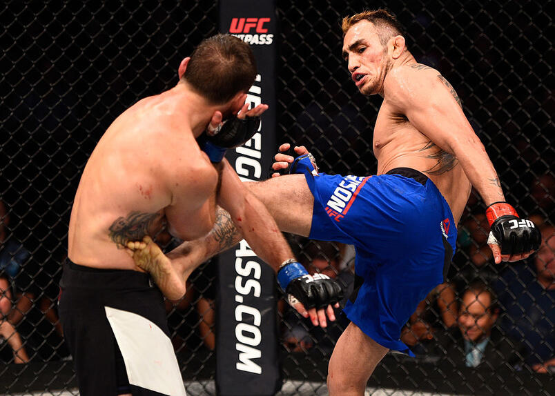 Tony Ferguson kicks Lando Vannat in their lightweight bout during the UFC Fight Night event on July 13, 2016 at Denny Sanford Premier Center in Sioux Falls, South Dakota. (Photo by Jeff Bottari/Zuffa LLC)