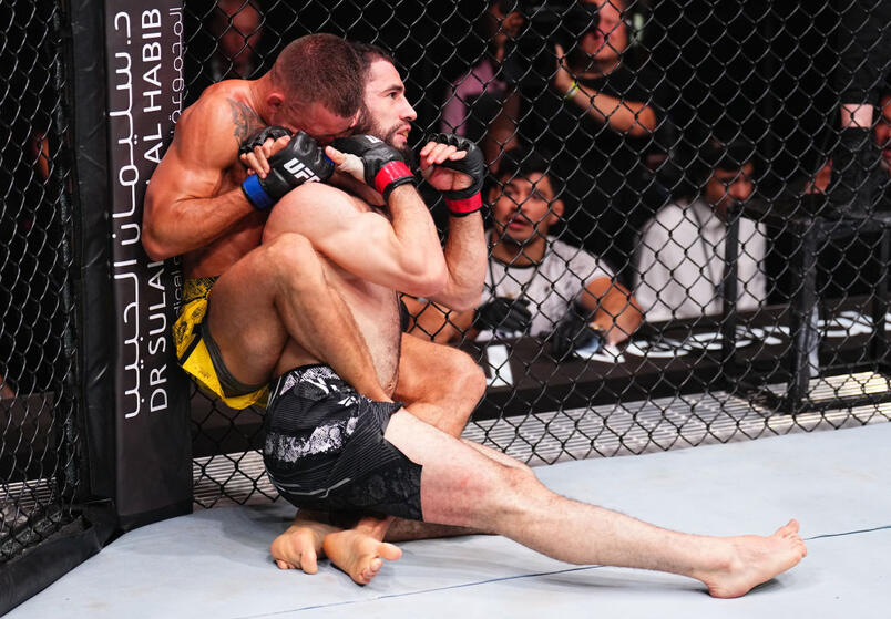 Felipe Lima of Brazil secures a rear choke submission against Muhammad Naimov of Tajikistan in a featherweight fight during the UFC Fight Night event at Kingdom Arena on June 22, 2024 in Riyadh, Saudi Arabia. (Photo by Chris Unger/Zuffa LLC)