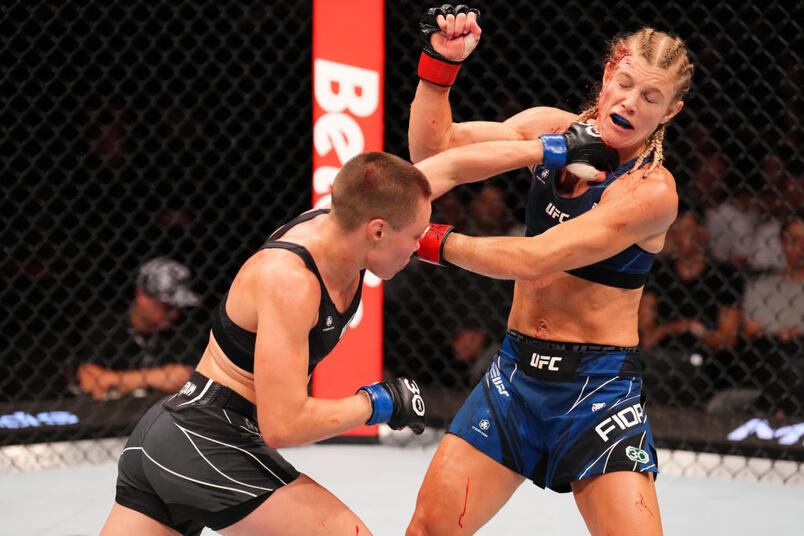 Rose Namajunas punches Manon Fiorot of France in a flyweight fight during the UFC Fight Night event at The Accor Arena on September 02, 2023 in Paris, France. (Photo by Josh Hedges/Zuffa LLC)