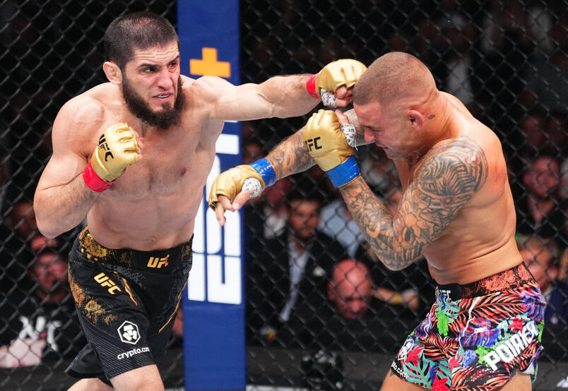 Islam Makhachev of Russia punches Dustin Poirier in the UFC lightweight championship fight during the UFC 302 event at Prudential Center on June 01, 2024 in Newark, New Jersey. (Photo by Jeff Bottari/Zuffa LLC)