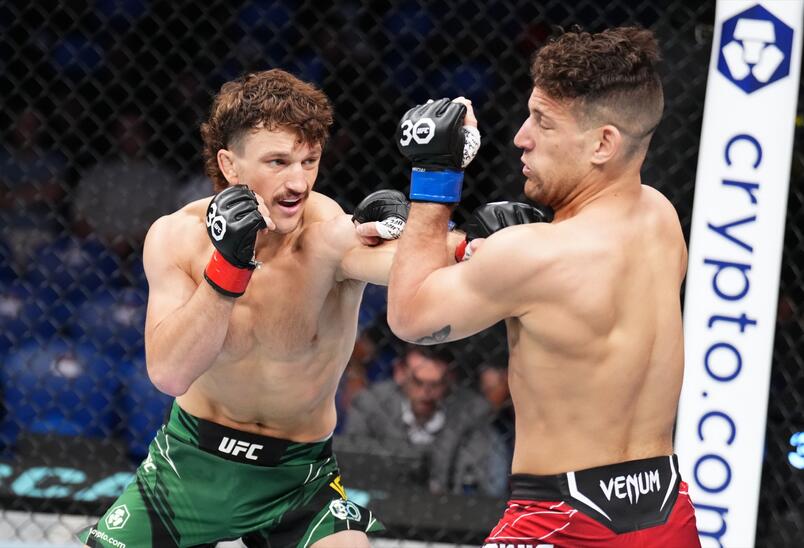 Jack Jenkins punches Don Shainis in featherweight fight during the UFC 284 event at RAC Arena on February 12, 2023 in Perth, Australia. (Photo by Chris Unger/Zuffa LLC)