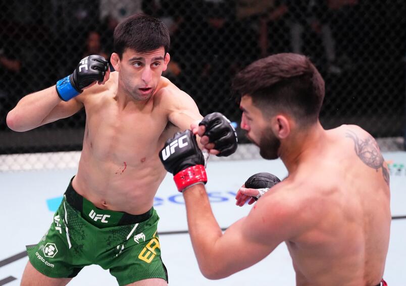 Steve Erceg punches Matt Schnell in a flyweight bout during the UFC Fight Night event at UFC APEX on March 02, 2024 in Las Vegas, Nevada. (Photo by Jeff Bottari/Zuffa LLC)