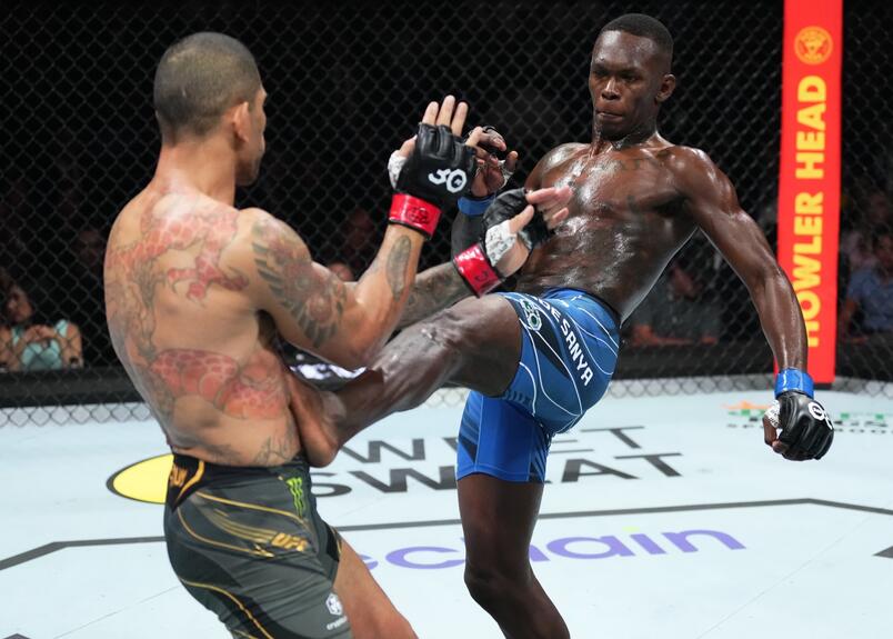 Israel Adesanya kicks Alex Pereira in the UFC middleweight championship fight during the UFC 287 event at Kaseya Center on April 08, 2023 in Miami, Florida. (Photo by Jeff Bottari/Zuffa LLC)