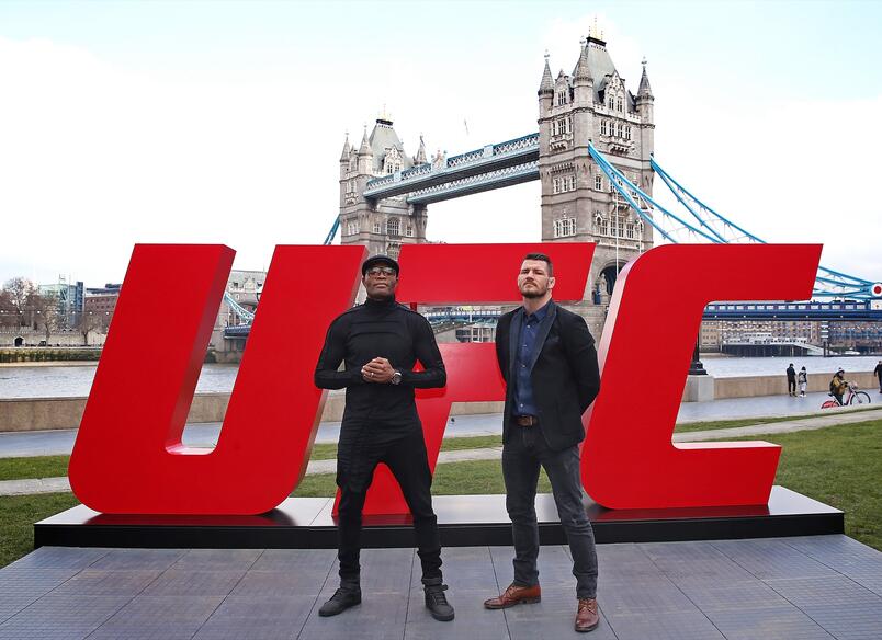 Michael Bisping (R) and Anderson Silva pose at Tower Bridge on February 25, 2016 in London, England. (Photo by Scott Heavey/Zuffa LLC)