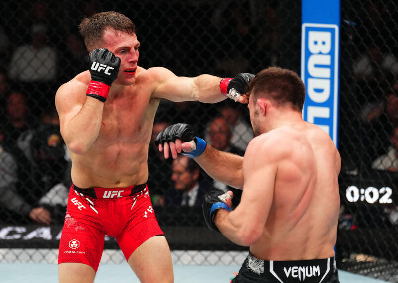 Brad Katona of Canada punches Garrett Armfield in a bantamweight bout during the UFC 297 event at Scotiabank Arena on January 20, 2024 in Toronto, Ontario. (Photo by Jeff Bottari/Zuffa LLC)