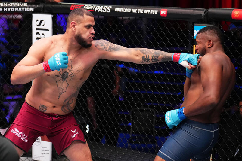 Talisson Teixeira of Brazil punches Arthur Lopes of Brazil in a heavyweight fight during Dana White's Contender Series Season Eight, Week Six at UFC APEX on September 17, 2024 in Las Vegas, Nevada. (Photo by Chris Unger)