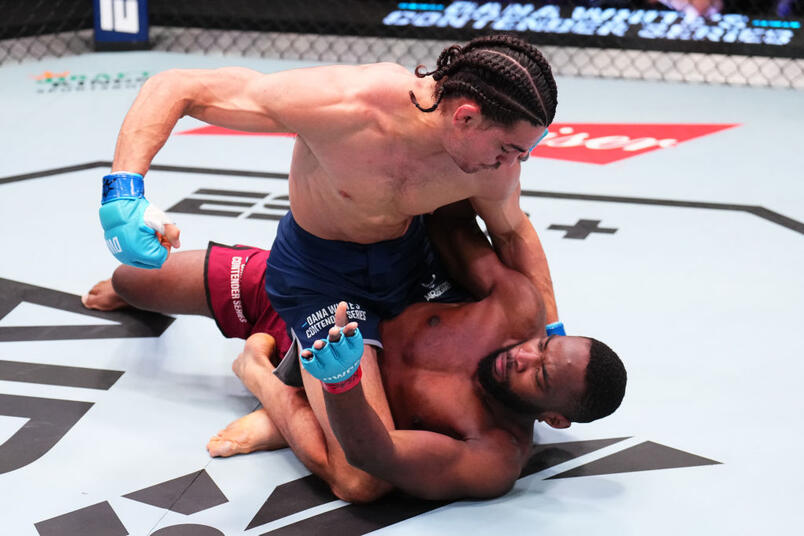 Jonathan Micallef of Australia punches Mohamed Ado of Niger in a welterweight fight during Dana White's Contender Series season eight, week ten at UFC APEX on October 15, 2024 in Las Vegas, Nevada. (Photo by Chris Unger)