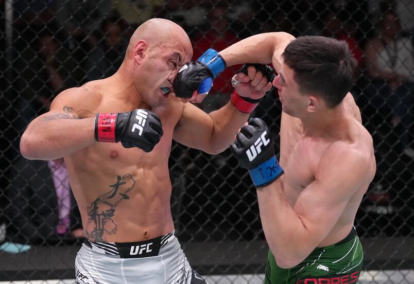 Manuel Torres of Mexico punches Frank Camacho of Guam in a lightweight fight at UFC APEX on May 14, 2022 in Las Vegas, Nevada. (Photo by Jeff Bottari/Zuffa LLC)