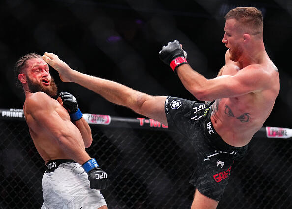 Justin Gaethje kicks Rafael Fiziev of Kazakstan in a lightweight fight during the UFC 313 event at T-Mobile Arena on March 08, 2025 in Las Vegas, Nevada. (Photo by Chris Unger/Zuffa LLC)
