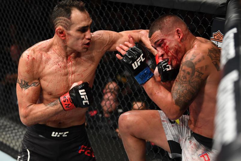 LAS VEGAS, NV - OCTOBER 06: Tony Ferguson punches Anthony Pettis in their lightweight bout during the UFC 229 event inside T-Mobile Arena on October 6, 2018 in Las Vegas, Nevada. (Photo by Josh Hedges/Zuffa LLC/Zuffa LLC)