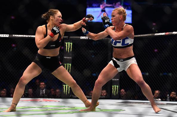 MELBOURNE, AUSTRALIA - NOVEMBER 15:  (L-R) Ronda Rousey faces Holly Holm in their UFC women's bantamweight championship bout during the UFC 193 event at Etihad Stadium on November 15, 2015 in Melbourne, Australia. (Photo by Jeff Bottari/Zuffa LLC/Zuffa LL