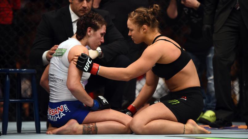 LOS ANGELES, CA - FEBRUARY 28:  (R-L) Ronda Rousey consoles Cat Zingano after Rousey defeated her by armbar submission in their UFC women's bantamweight championship bout during the UFC 184 event at the Staples Center on February 28, 2015 in Los Angeles, 