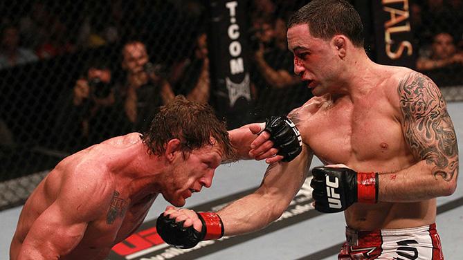 HOUSTON, TX - OCT. 08: (R-L) Frankie Edgar punches Gray Maynard during the UFC 136 event at Toyota Center. (Photo by Nick Laham/Zuffa LLC)