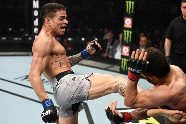 Felipe Colares of Brazil kicks Domingo Pilarte in their bantamweight bout during the UFC Fight Night