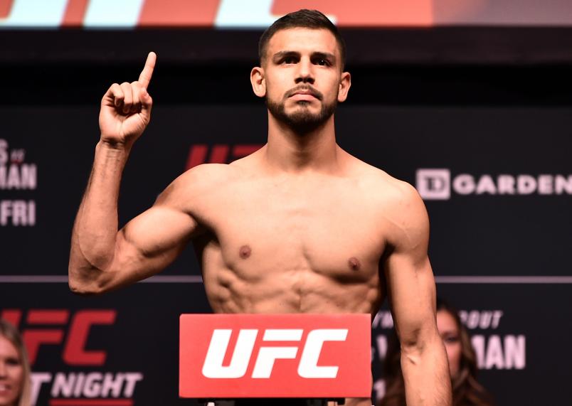 Yair Rodriguez poses on the scale during the UFC weigh-in during the UFC weigh-in