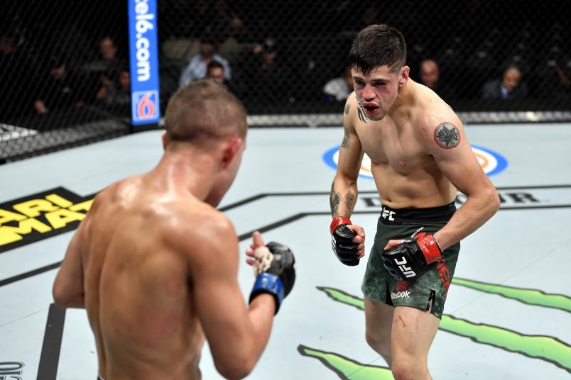 Brandon Moreno of Mexico stares down Kai Kara-France of New Zealand in their flyweight bout during the UFC 245.