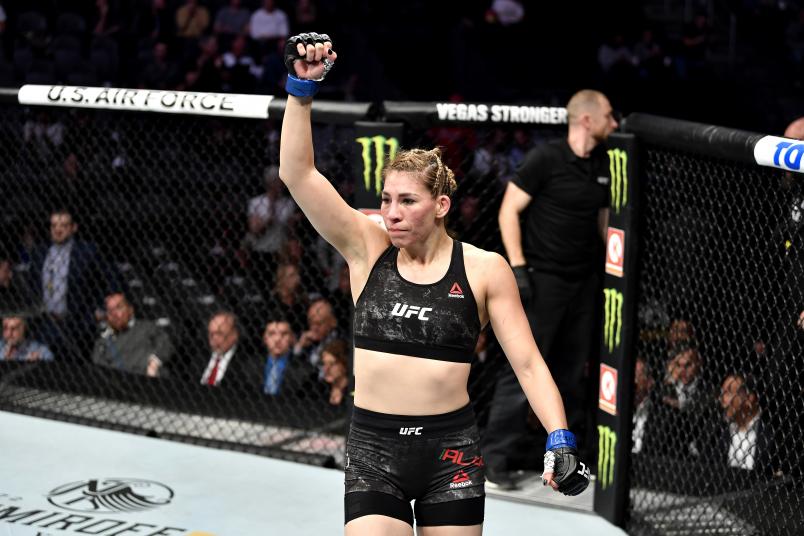 Irene Aldana of Mexico celebrates her victory over Ketlen Vieira of Brazil in their women's bantamweight bout during the UFC 245