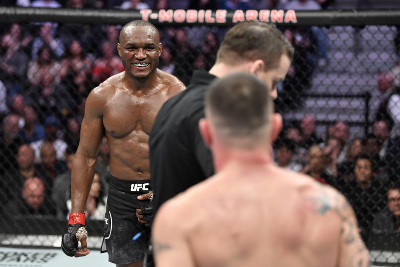 Kamaru Usman of Nigeria stares down Colby Covington in their UFC welterweight championship bout during the UFC 245