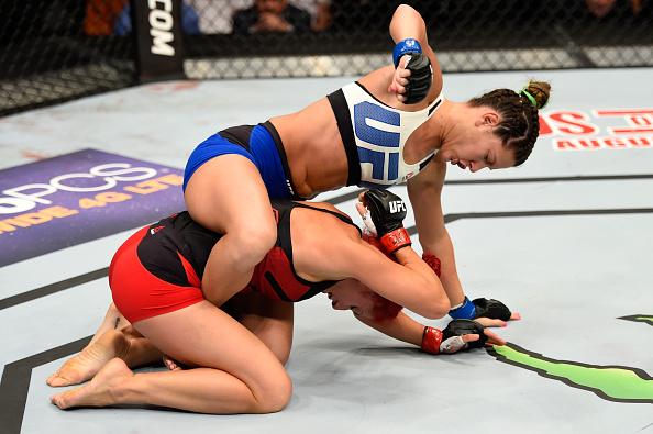 LAS VEGAS, NV - AUGUST 20: Cortney Casey fights Randa Markos of Iraq in their women's strawweight bout during the UFC 202 event at T-Mobile Arena on August 20, 2016 in Las Vegas, Nevada. (Photo by Josh Hedges/Zuffa LLC/Zuffa LLC via Getty Images)