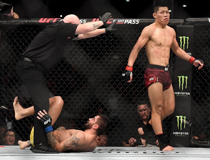Li Jingliang of China celebrates after his TKO victory over Elizeu dos Santos of Brazil in their welterweight bout during the UFC Fight Night event at Shenzhen Universiade Sports Centre on August 31, 2019 in Shenzhen, China. (Photo by Zhe Ji/Getty Images)