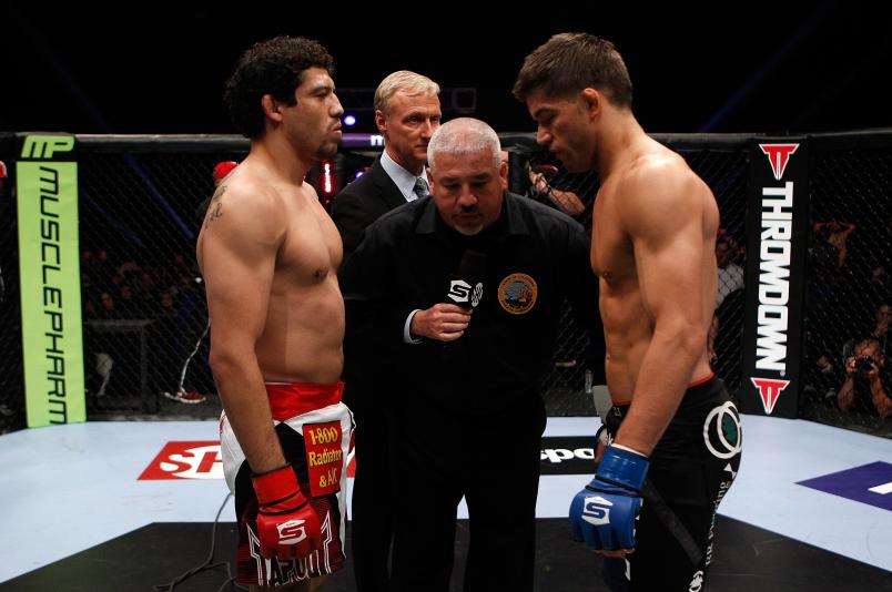 Gilbert Melendez (L) and Josh Thomson face off before their fight during the Strikeforce