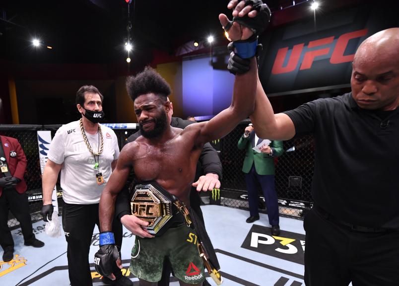 LAS VEGAS, NEVADA - MARCH 06: Aljamain Sterling reacts after his victory by disqualification over Petr Yan of Russia due to an intentional foul in their UFC bantamweight championship fight during the UFC 259