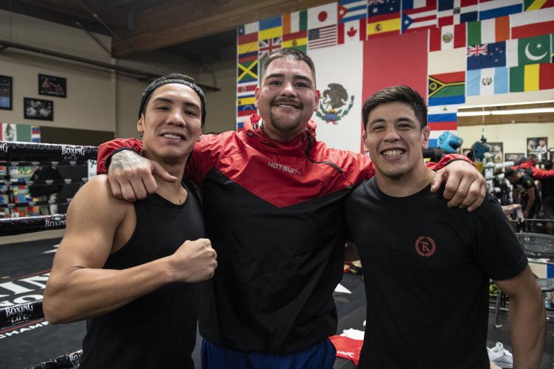 Boxing super stars Oscar Valdez and Andy Ruiz with flyweight champion Brandon Moreno