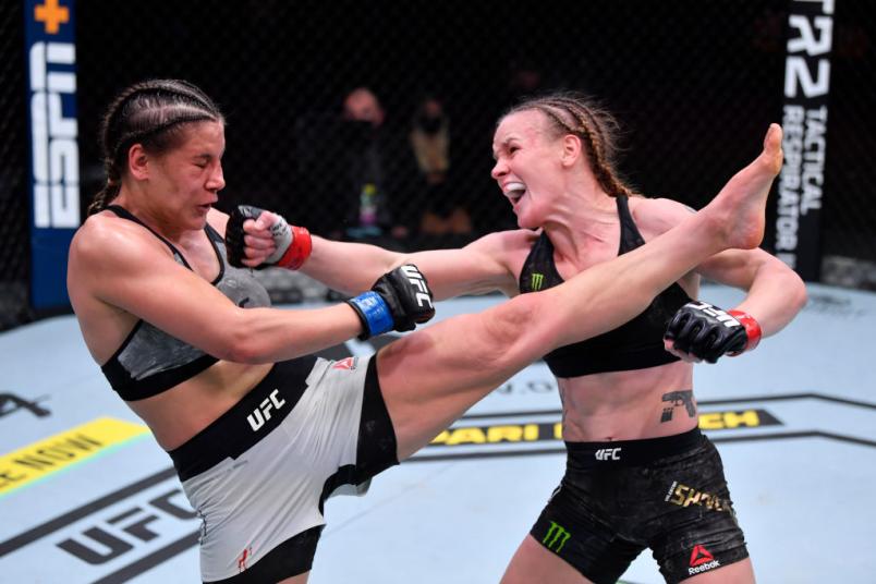 Valentina Shevchenko punches Jennifer Maia in their title fight at UFC 255 at UFC Apex in Las Vegas, Nevada. (Zuffa LLC)