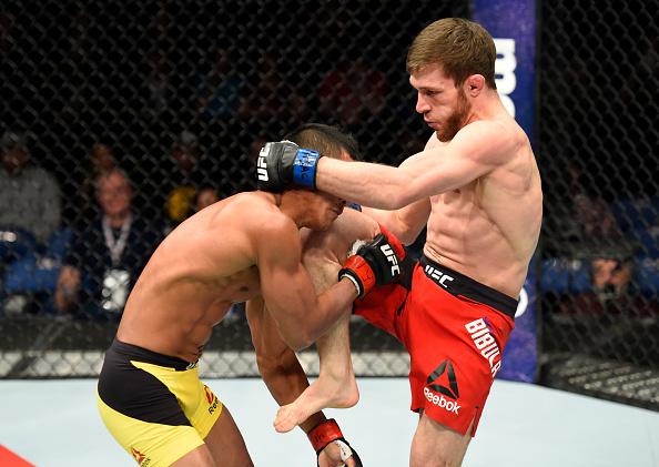 BUFFALO, NY - APRIL 08: Magomed Bibulatov of Russia (R) lands a kick on Jenel Lausa of the Philippines (L) in their flyweight bout during the UFC 210 event at KeyBank Center on April 8, 2017 in Buffalo, New York. (Photo by Josh Hedges/Zuffa LLC/Zuffa LL