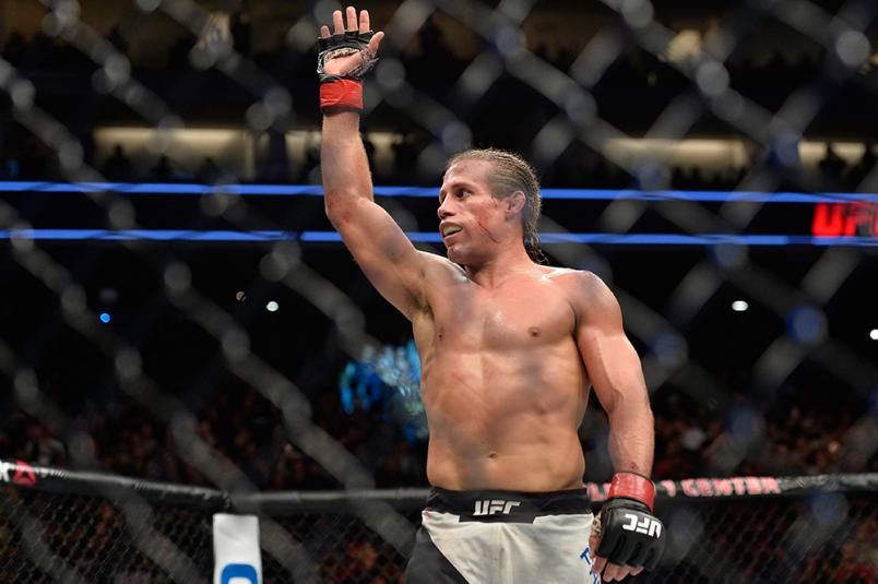 SACRAMENTO, CA - DECEMBER 17: Urijah Faber raises his hand after facing Brad Pickett in their bantamweight bout during the UFC Fight Night event inside the Golden 1 Center Arena on December 17, 2016 in Sacramento, California. (Photo by Brandon Magnus/Zuf
