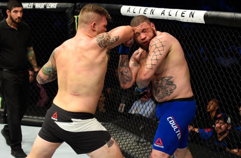 DALLAS, TX - MAY 13: (L-R) Chase Sherman elbows Rashad Coulter in their heavyweight fight during the UFC 211 event at the American Airlines Center on May 13, 2017 in Dallas, Texas. (Photo by Josh Hedges/Zuffa LLC/Zuffa LLC via Getty Images)