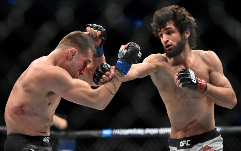 BROOKLYN, NEW YORK - APRIL 07: (R-L) Zabit Magomedsharipov of Russia punches Kyle Bochniak in their featherweight bout during the UFC 223 event inside Barclays Center on April 7, 2018 in Brooklyn, New York. (Photo by Brandon Magnus/Zuffa LLC/Zuffa LLC v