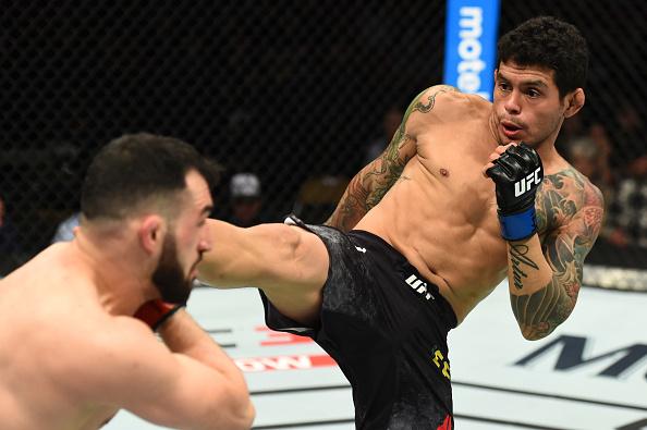 AUSTIN, TX - FEBRUARY 18: Diego Ferreira of Brazil (R) kicks Jared Gordon in their lightweight bout during the UFC Fight Night event at Frank Erwin Center on February 18, 2018 in Austin, Texas. (Photo by Josh Hedges/Zuffa LLC/Zuffa LLC via Getty Images)