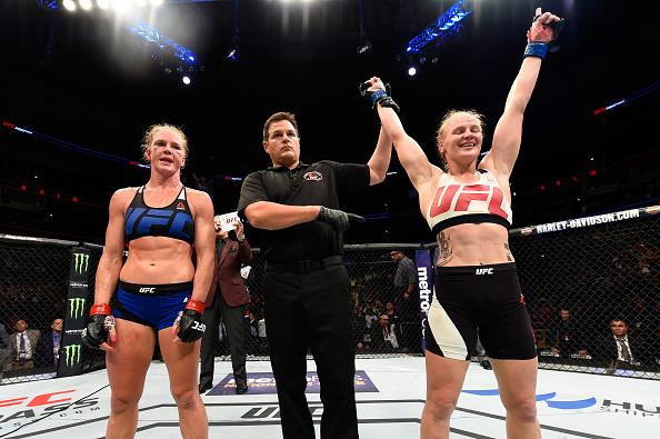 Valentina Shevchenko of Kyrgyzstan celebrates after defeating Holly Holm by unanimous decision in their women's bantamweight bout during the UFC Fight Night event at the United Center on July 23, 2016 in Chicago, Illinois. (P