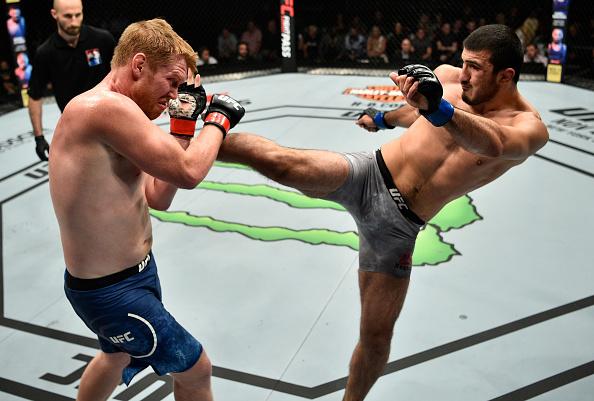 GDANSK, POLAND - OCTOBER 21: (R-L) Ramazan Emeev of Russia kicks Sam Alvey in their middleweight bout during the UFC Fight Night event inside Ergo Arena on October 21, 2017 in Gdansk, Poland. (Photo by Jeff Bottari/Zuffa LLC/Zuffa LLC via Getty Images)