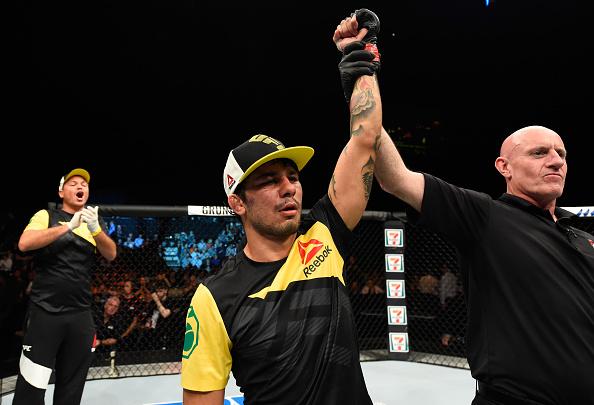 GLASGOW, SCOTLAND - JULY 16: (L-R) Alexandre Pantoja of Brazil celebrates his submission victory over Neil Seery of Ireland in their flyweight bout during the UFC Fight Night event at the SSE Hydro Arena Glasgow on July 16, 2017 in Glasgow, Scotland. (Ph